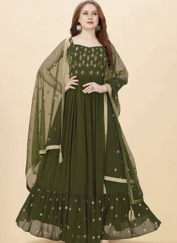 Attrective Looking These Designer Gown in Fine Colored Pair With Dupatta.These Gown Are Faux Georgette And Dupatta Are Fabricated On Net Pair.Its Beautified With Heavy Designer Embroidery,Hand Work.