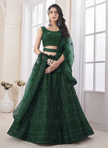 For A Designer Look,Grab These Lehenga Choli in Fine Colored.These Lehenga And Choli Are Fabricated On Soft Net Pair With Soft Net Dupatta.Its Beautified With Heavy Designer Embroidery,Zarkan Work.