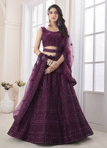 For A Designer Look,Grab These Lehenga Choli in Fine Colored.These Lehenga And Choli Are Fabricated On Soft Net Pair With Soft Net Dupatta.Its Beautified With Heavy Designer Embroidery,Zarkan Work.