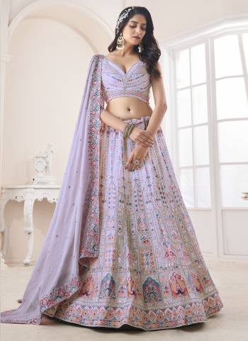 For A Designer Look,Grab These Lehenga Choli in Fine Colored.These Lehenga And Choli Are Fabricated On Georgette Pair With Soft Net Dupatta.Its Beautified With Heavy Designer Embroidery,Zarkan Work.