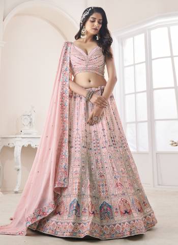 For A Designer Look,Grab These Lehenga Choli in Fine Colored.These Lehenga And Choli Are Fabricated On Georgette Pair With Soft Net Dupatta.Its Beautified With Heavy Designer Embroidery,Zarkan Work.