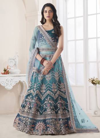 For A Designer Look,Grab These Lehenga Choli in Fine Colored.These Lehenga And Choli Are Fabricated On Art Silk Pair With Soft Net Dupatta.Its Beautified With Heavy Designer Embroidery,Stone Work.