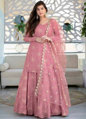 Attrective These Lehenga Suit in Fine Colored Pair With Bottom And Dupatta.These Top Are Georgette And Bottom Are Georgette And Pair With Net Dupatta.Its Beautified With Santoon Inner.Its Beautified With Heavy Designer Sequance Embroidery Work.