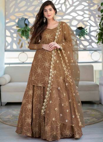 Attrective These Lehenga Suit in Fine Colored Pair With Bottom And Dupatta.These Top Are Georgette And Bottom Are Georgette And Pair With Net Dupatta.Its Beautified With Santoon Inner.Its Beautified With Heavy Designer Sequance Embroidery Work.