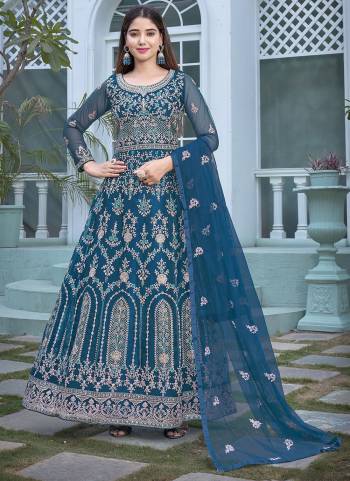 Attrective Looking These Anarkali Suit in Fine Colored Pair With Bottom And Dupatta.These Top And Dupatta Are Fabricated On Butterfly Net Pair With Japan Satin Bottom And  Inner.Its Beautified With Heavy Designer Embroidery Work.