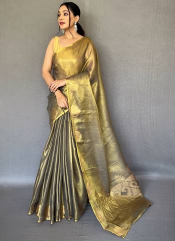 Garb These Party Wear Saree With Blouse in Fine Colored.These Saree And Blouse is Fabricated On Tissue Silk.Its Beautified With Heavy Weavon Jari,Rich Pallu Designer.