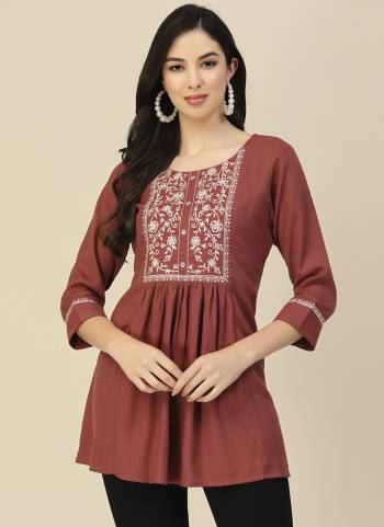 Garb These Beautiful Looking Readymade Short Kurti.These Kurtis Fabricated On Poly Rayon.Its Beautified With Designer Floral Embroidery Work.