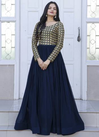 Garb These Beautiful Looking Readymade Gown.These Gown is Fabricated On Faux Georgette.Its Beautified With Designer Sequance,Jari Embroidery Work.