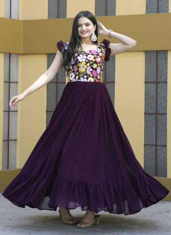 Garb These Beautiful Looking Readymade Gown.These Gown is Fabricated On Faux Georgette.Its Beautified With Designer Sequance,Thread Embroidery Work.