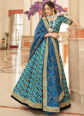 For A Designer Look,Grab These Lehenga Choli in Fine Colored.These Lehenga Are Art Silk And Blouse Are Fabricated On Art Silk Pair With Organza Dupatta.Its Beautified With Designer Thread,Dori,Sequance Embroidery Work.