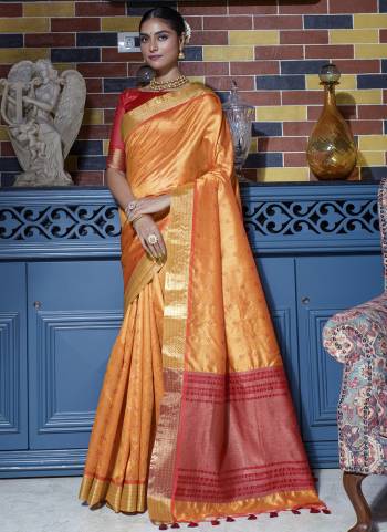 Garb These Party Wear Saree in Fine Colored.These Saree And Blouse is Fabricated On Tussar Silk.Its Beautified With Weaving Bandhni Style Designer.