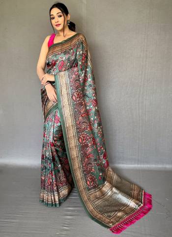 Garb These Party Wear Saree With Blouse in Fine Colored.These Saree And Blouse is Fabricated On Soft Silk Cotton.Its Beautified With Designer Kalamkari Printed.