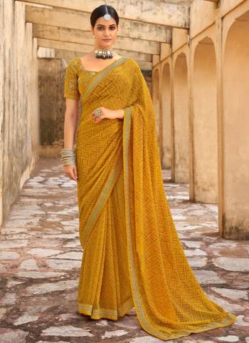 Look These Saree in Fine Colored.These Saree Are Georgette And Blouse is Fabricated On Dupion Pair.Its Beautified With Designer Bandhni Printed With Embroidery Work Lace Border Blouse.