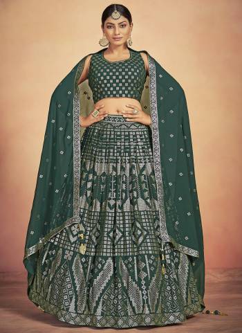 For A Designer Look,Grab These Lehenga Choli in Fine Colored.These Lehenga And Blouse Are Fabricated On Georgette Pair With Georgette Dupatta.Its Beautified With Designer Sequance Embroidery Work.