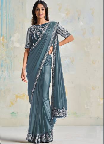 Look Attrective These Designer Party Wear Saree in Fine Colored.These Saree Are Satin Silk Crepe And Blouse Satin Silk Crepe is Fabricated.Its Beautified Designer Embroidery Work.