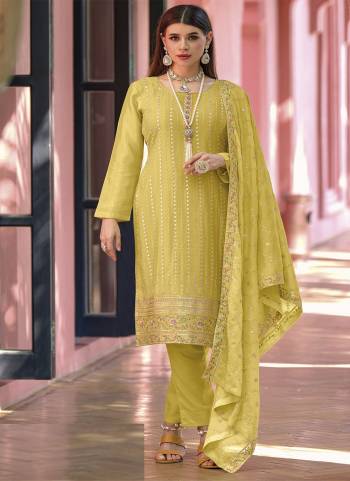 This yellow colored suit is prettified with floral embroidered and sequins work as shown which makes it appear classy. This top is made of georgette fabric which is accompanied with santoon bottom, santoon lining and georgette embroidered dupatta. Women can buy this suit to wear for their party, sangeet, events and ideal for any fashionista.