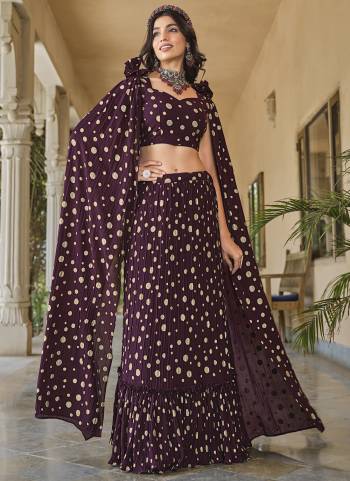 For A Designer Look,Grab These Lehenga Choli in Fine Colored.These Lehenga And Blouse Are Fabricated On Georgette Pair With Georgette Dupatta.Its Beautified With Designer Metalic Foil Printed With Crush Pattern.