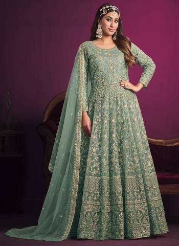 Grab These Anarkali Suit in Fine Colored Pair With Bottom And Dupatta.These Top And Dupatta Are Fabricated On Net Pair With Santoon Bottom And Inner.Its Beautified With Heavy Designer Coding Embroidery Work.