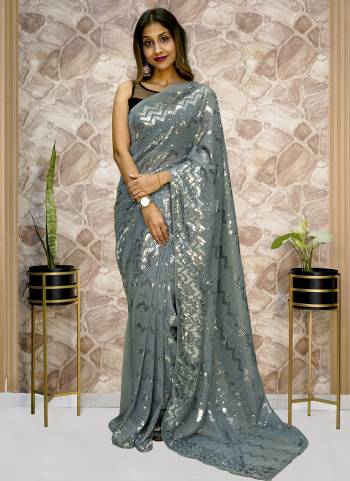 Attrective Look These Saree in Fine Colored.These Saree Are Georgette And Blouse is Mono Silk Fabricated.Its Beautified With Designer Sequance Embroidery Work.