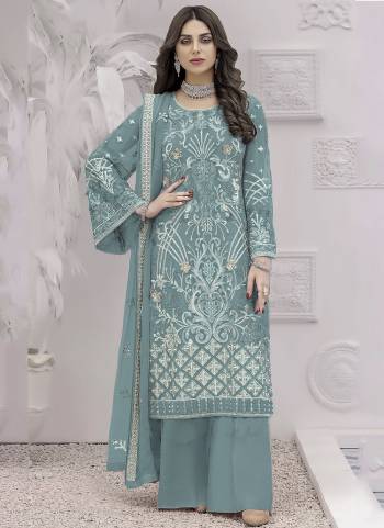 Attrective These Designer Suit in Fine Colored Pair With Bottom And Dupatta.These Top Are Faux Georgette And Dupatta Are Fabricated On Nazmin Pair With Santoon Bottom.Its Beautified With Santoon Inner.Its Beautified With Heavy Designer Embroidery Work.