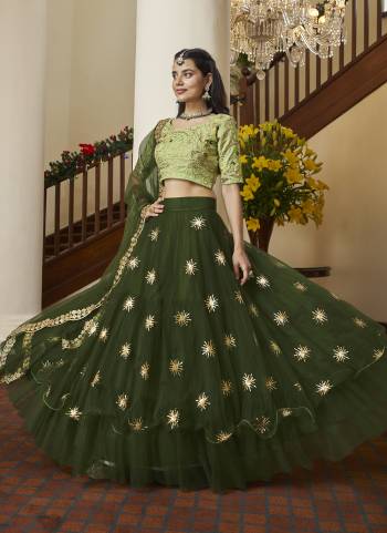 For A Designer Look,Grab These Lehenga Choli in Fine Colored.These Lehenga And Dupatta Are Fabricated On Butterfly Net Pair With Kum Kum Silk Blouse.Its Beautified With Heavy Thread,Sequance Embroidery Work.