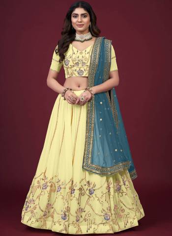 For A Designer Look,Grab These Lehenga Choli in Fine Colored.These Lehenga And Blouse Are Fabricated On Faux Georgette Pair With Butterfly Net Blouse.Its Beautified With Designer Thread,Jari,Sequance Embroidery Work.