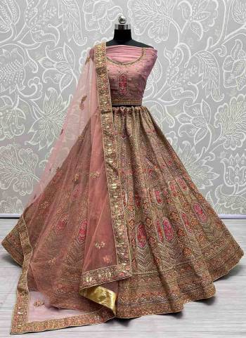 For A Fancy Designer Look,Grab These Lehenga Choli With Dupatta in Fine Colored.These Lehenga And Choli Are Bridal Net And Dupatta Are Fabricated On Soft Net Pair.Its Beautified With Designer Fancy Multy Thread,Sequance,Dori Embroidery,Diamond Work.