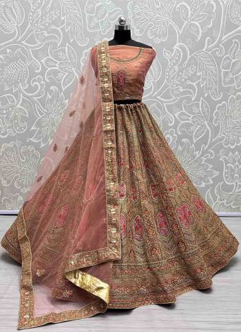 For A Fancy Designer Look,Grab These Lehenga Choli With Dupatta in Fine Colored.These Lehenga And Choli Are Bridal Net And Dupatta Are Fabricated On Soft Net Pair.Its Beautified With Designer Fancy Multy Thread,Sequance,Dori Embroidery,Diamond Work.