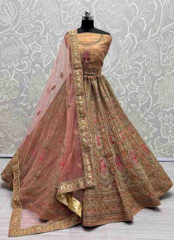 For A Fancy Designer Look,Grab These Lehenga Choli With Dupatta in Fine Colored.These Lehenga And Choli Are Bridal Net And Dupatta Are Fabricated On Soft Net Pair.Its Beautified With Designer Fancy Multy Thread,Sequance,Dori Embroidery,Diamond Work.