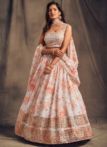 For A Designer Look,Grab These Lehenga Choli in Fine Colored.These Lehenga And Blouse Are Fabricated On Organza Pair With Organza Dupatta.Its Beautified With Designer Printed With Jari,Sequance Embroidery Work.