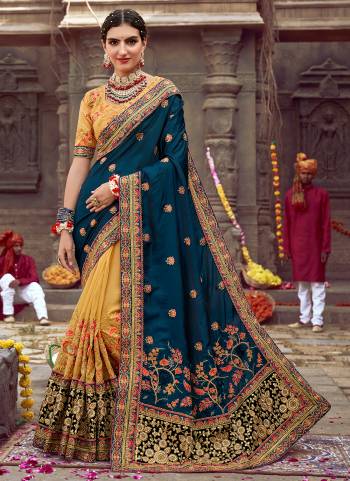 Garb These Designer Half Half Saree in Fine Colored.These Saree Are Sana,Burfi Fancy Fab.And Blouse is Fabricated On Art Silk  Pair.Its Beautified With Blooming Color,Heavy Embroidery,Diamond Work.