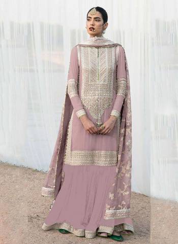 Attrective These Designer Suit in Fine Colored Pair With Bottom And Dupatta.These Top Are Faux Georgette And Dupatta Are Fabricated On Nazmin Pair With Faux Georgette Bottom.Its Beautified With Santoon Inner.Its Beautified With Heavy Designer Embroidery Work.