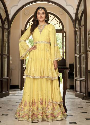 Attrective These Sharara Suit in Fine Colored Pair With Free Size Stiched Bottom And Dupatta.These Top And Bottom Are Fabricated On Chinon Pair With Chinon Dupatta.Its Beautified With Santoon Inner.Its Beautified With Heavy Designer Embroidery Work.