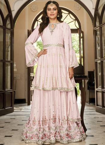 Attrective These Sharara Suit in Fine Colored Pair With Free Size Stiched Bottom And Dupatta.These Top And Bottom Are Fabricated On Chinon Pair With Chinon Dupatta.Its Beautified With Santoon Inner.Its Beautified With Heavy Designer Embroidery Work.