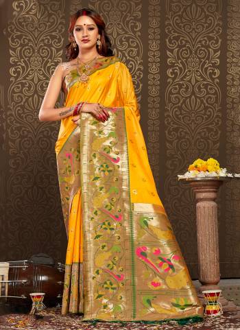 Garb These Party Wear Saree in Fine Colored.These Saree And Blouse is Fabricated On Paithani Silk.Its Beautified With Paithani Weavon Designer.