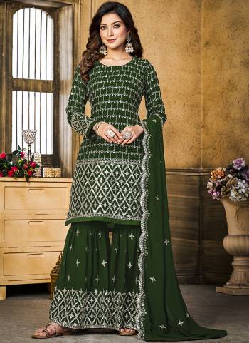 Grab These Designer Suit in Fine Colored Pair With Bottom And Dupatta.These Top And Dupatta Are Fabricated On Faux Georgette Pair With Faux Georgette Bottom.Its Beautified With Santoon Inner.Its Beautified With Heavy Designer Sequance Embroidery Work.