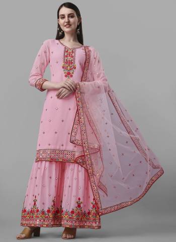 Garb These Salwar Suit in Fine Colored Pair With Bottom And Dupatta.These Top Are Faux Georgette And Bottom Are Fabricated On Faux Georgette Pair With Soft Net Dupatta.Its Beautified With Santoon Inner.Its Beautified With Heavy Designer Embroidery Work.