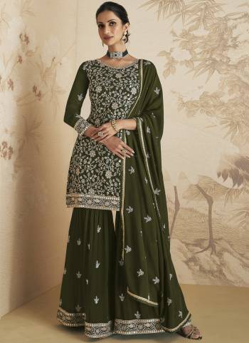 Garb These Designer Sharara Suits in Fine Colored Pair With Dupatta.These Top Are Georgette And Dupatta Are Fabricated On Georgette Pair With Georgette Bottom.Its Beautified With Heavy Designer Thread,Jari Embroidery Work.