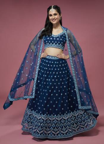 Attrective Looking This Partywear Fine Color Heavy Designer Choli Fabric Are Net And Lahenga Net And Dupatta Net In Fabricated Beautified With Attrective Thread,Sequance Embroidery Work. Buy Now.