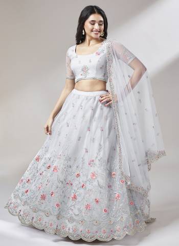 Garb This Partywear Lahenga Choli Fine Color.These Designer Choli Fabric Are Net And Lahenga Net And Dupatta Net In Fabricated Beautified With Attrective Thread,Sequance Embroidery Work. Buy Now.