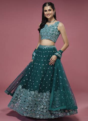 Garb This Partywear Lahenga Choli Fine Color.These Designer Choli Fabric Are Net And Lahenga Net And Dupatta Net In Fabricated Beautified With Attrective Thread,Sequance Embroidery Work. Buy Now.