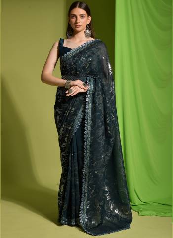 Attrective Look These Saree in Fine Colored.These Saree Are Georgette And Blouse is Mono Banglori Fabricated.Its Beautified With Designer 3MM Sequance Embroidery Work.