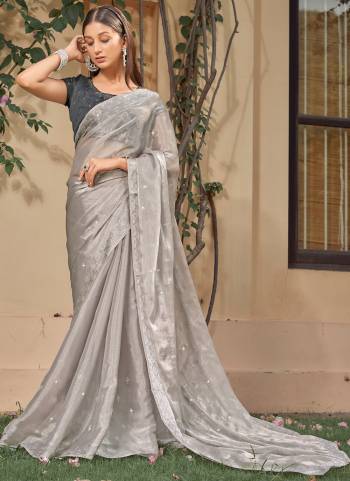 Garb These Fancy Saree in Fine Light Colored.These Saree Are Burberry And Blouse is Fabricated On Satin Pair.Its Beautified With Designer Swarovski Work.