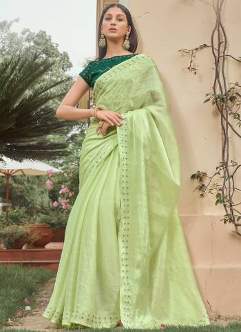 Garb These Fancy Saree in Fine Light Colored.These Saree Are Burberry And Blouse is Fabricated On Satin Pair.Its Beautified With Designer Swarovski Work.