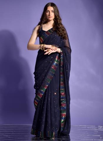 Attrective Look These Saree in Fine Colored.These Saree Are Georgette And Blouse is Mono Banglori Fabricated.Its Beautified With Designer 4 Color Sequance Embroidery Work Lace Border.