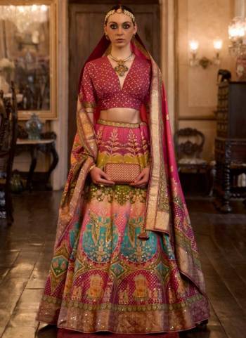 For A Fancy Designer Look,Grab These Lehenga Choli With Dupatta in Fine Colored.These Lehenga And Choli Are Rajwadi Silk And Dupatta Are Fabricated On Rajwadi Silk Pair.Its Beautified With Designer Printed With Sparkle N Aari,Mirror Embroidery Work.