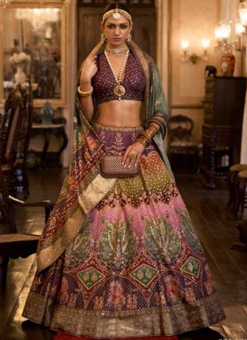 For A Fancy Designer Look,Grab These Lehenga Choli With Dupatta in Fine Colored.These Lehenga And Choli Are Rajwadi Silk And Dupatta Are Fabricated On Rajwadi Silk Pair.Its Beautified With Designer Printed With Sparkle N Aari,Mirror Embroidery Work.