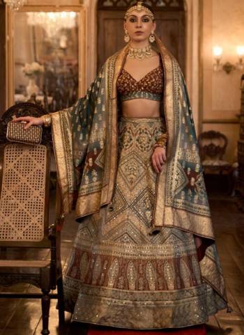 For A Fancy Designer Look,Grab These Lehenga Choli With Dupatta in Fine Colored.These Lehenga And Choli Are Rajwadi Silk And Dupatta Are Fabricated On Rajwadi Silk Pair.Its Beautified With Designer Printed With Sparkle N Aari,Mirror Embroidery Work.