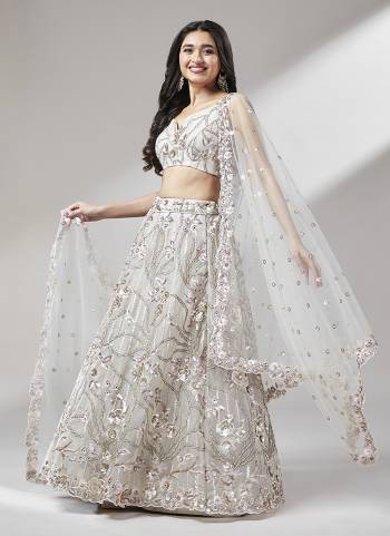 Attrective Looking This Partywear Fine Color Heavy Designer Choli Fabric Are Net And Lahenga Net And Dupatta Net In Fabricated Beautified With Attrective Thread,Sequance Embroidery Work. Buy Now.