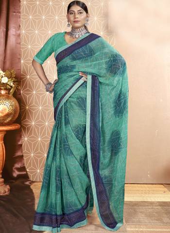 Attrective These Printed Designer Saree in Fine Colored.These Saree Are Chiffon And Blouse is Fabricated On Art Silk Pair.Its Beautified With Designer Printed With Swarovski Work Lace Border.